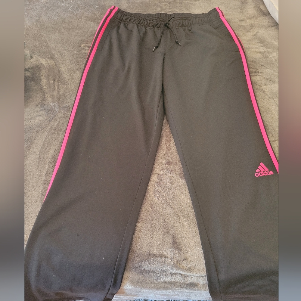 Adidas running pants.  Black with Pink stripes and pockets